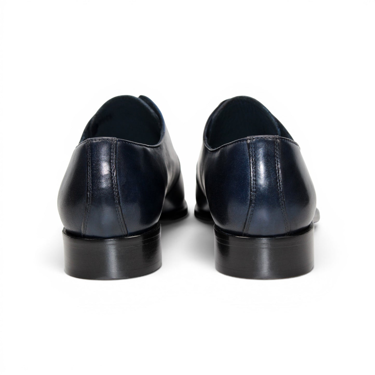 A side view of the Duca Sermoneta Navy by Duca Di Matiste—a navy leather oxford dress shoe with laces, crafted from premium calf leather, displayed on a white background.