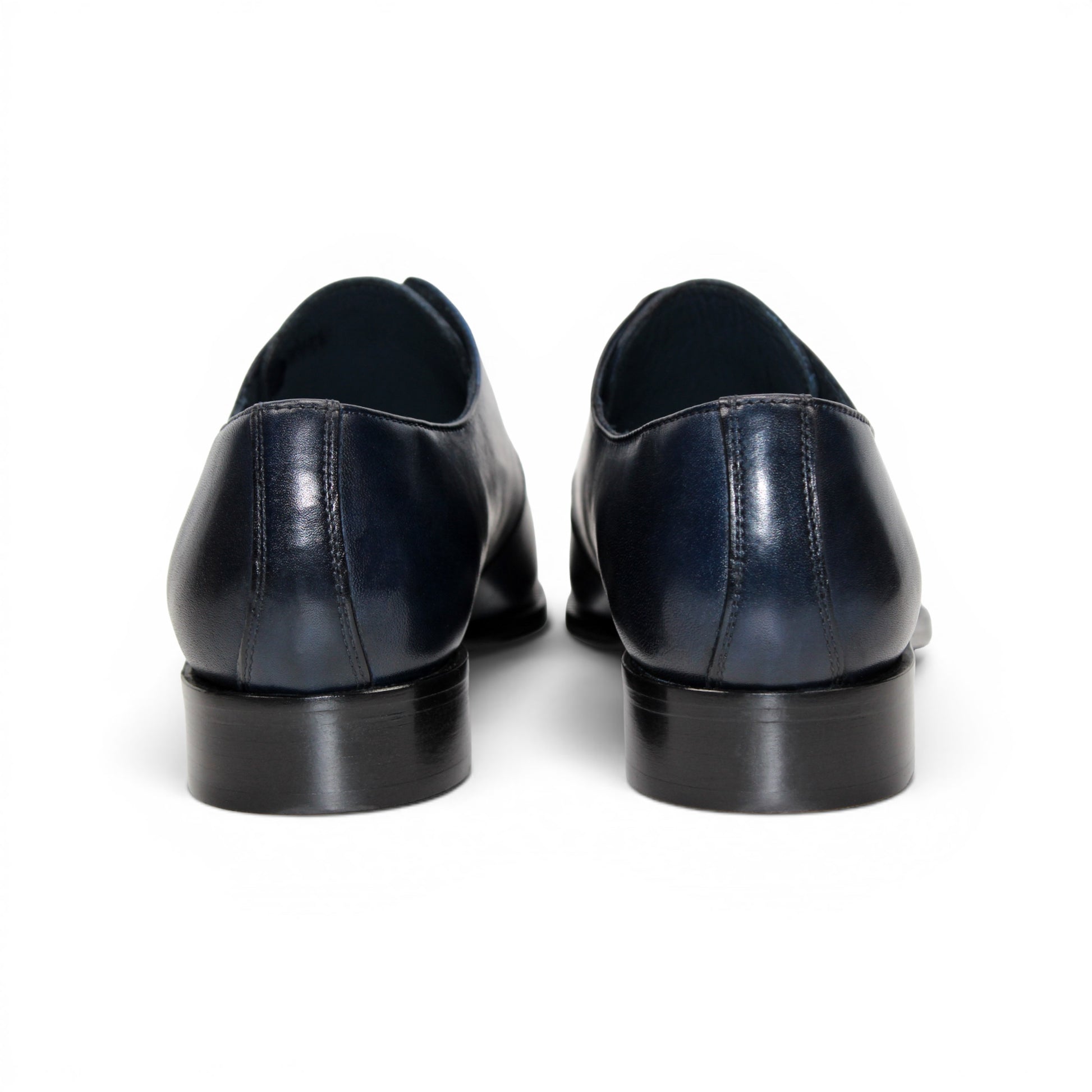 A side view of the Duca Sermoneta Navy by Duca Di Matiste—a navy leather oxford dress shoe with laces, crafted from premium calf leather, displayed on a white background.