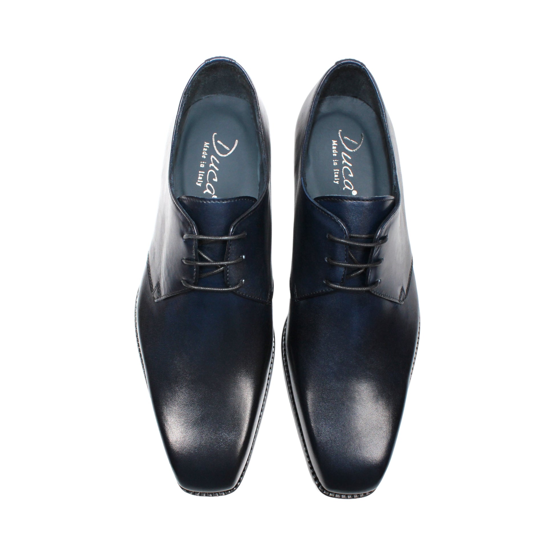 A side view of the Duca Sermoneta Navy by Duca Di Matiste—a navy leather oxford dress shoe with laces, crafted from premium calf leather, displayed on a white background.