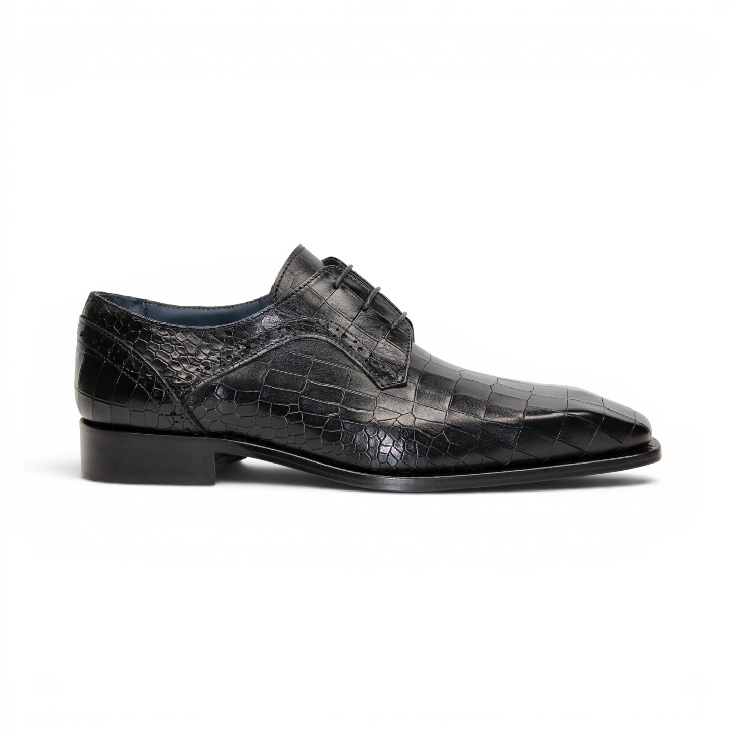 The Duca Di Matiste Duca Spada Black is a black Italian leather dress shoe with an embossed crocodile pattern, low heel, and lace-up design, shown in side profile on a white background. Expertly crafted in Italy for elegant style.