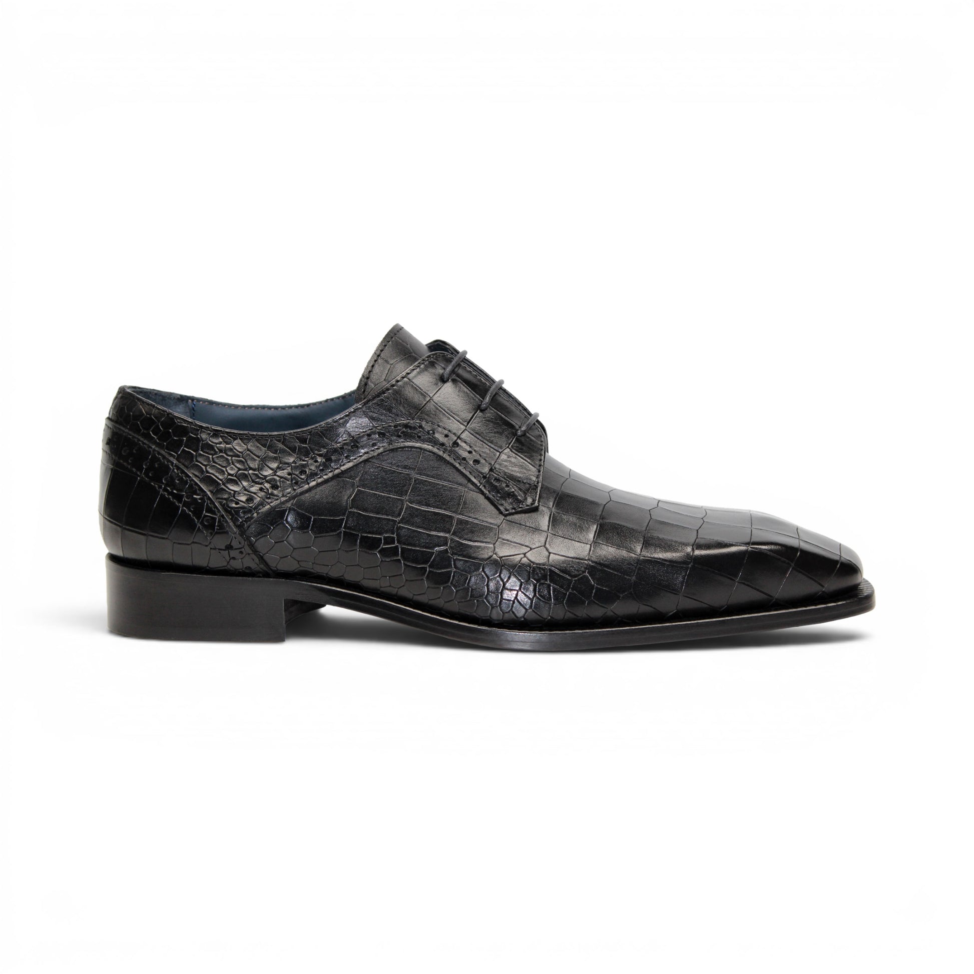 The Duca Di Matiste Duca Spada Black is a black Italian leather dress shoe with an embossed crocodile pattern, low heel, and lace-up design, shown in side profile on a white background. Expertly crafted in Italy for elegant style.