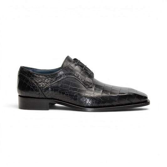 The Duca Di Matiste Duca Spada Black is a black Italian leather dress shoe with an embossed crocodile pattern, low heel, and lace-up design, shown in side profile on a white background. Expertly crafted in Italy for elegant style.