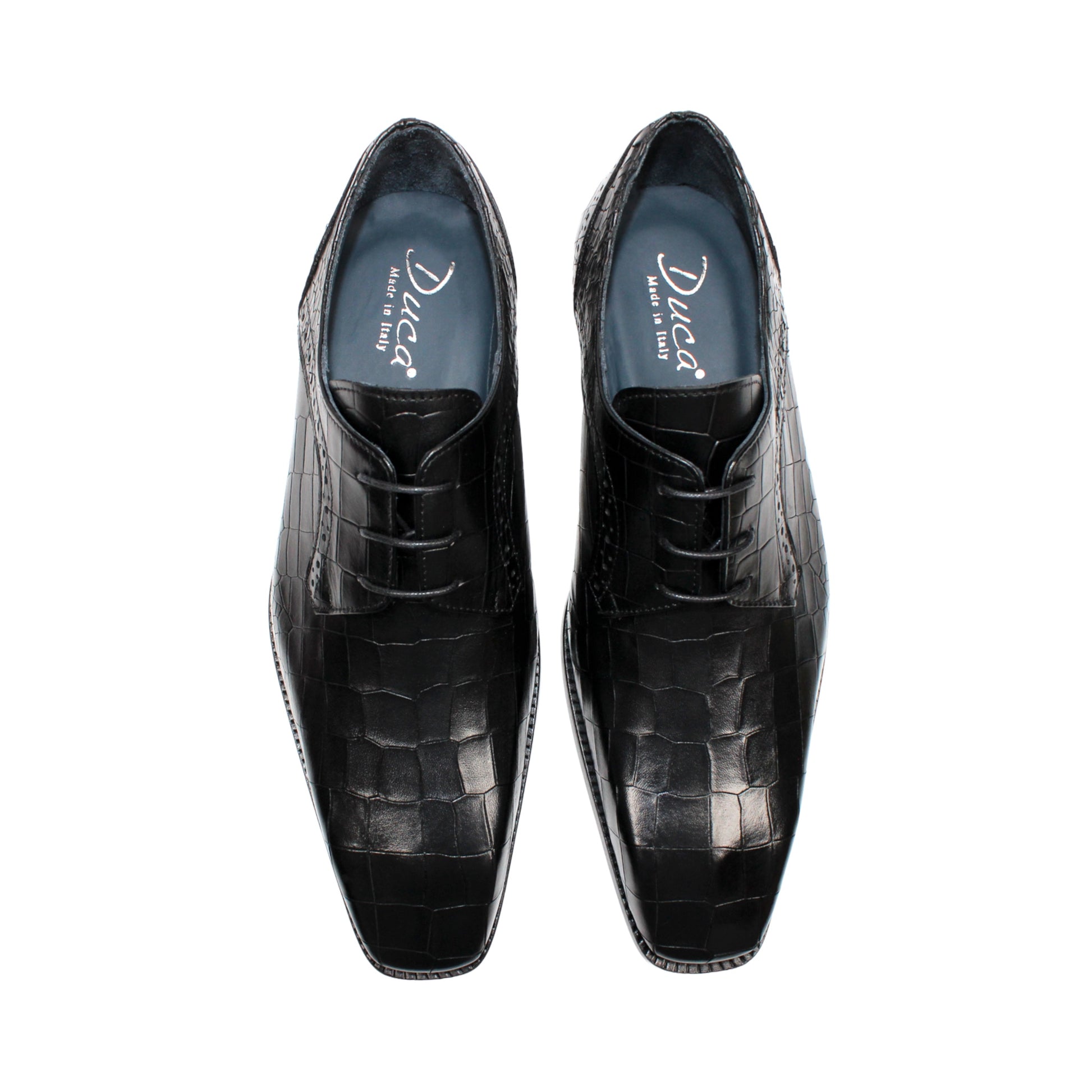 The Duca Di Matiste Duca Spada Black is a black Italian leather dress shoe with an embossed crocodile pattern, low heel, and lace-up design, shown in side profile on a white background. Expertly crafted in Italy for elegant style.