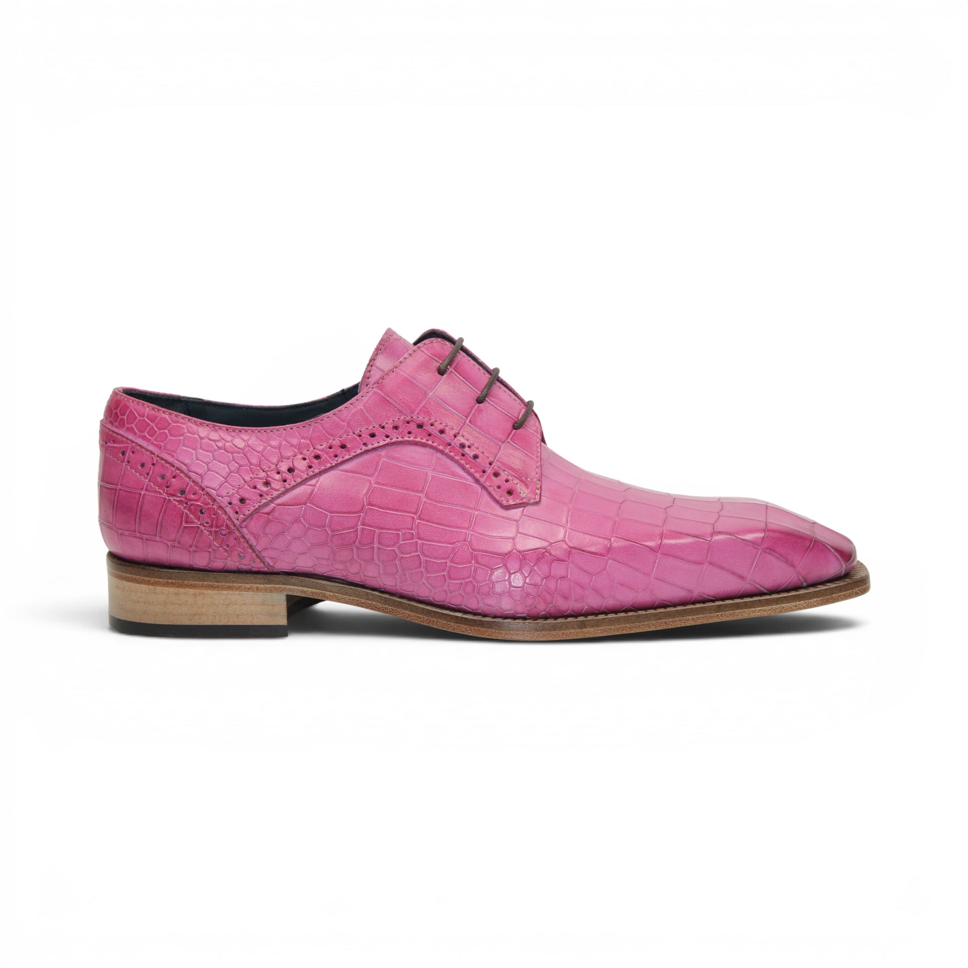 The Duca Di Matiste Duca Spada Pink is a single pink Italian leather dress shoe featuring a crocodile pattern, black laces, and a light brown sole, shown in a side view.