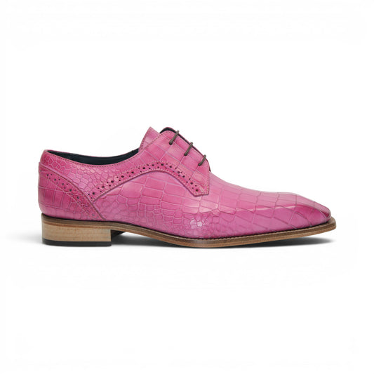 The Duca Di Matiste Duca Spada Pink is a single pink Italian leather dress shoe featuring a crocodile pattern, black laces, and a light brown sole, shown in a side view.