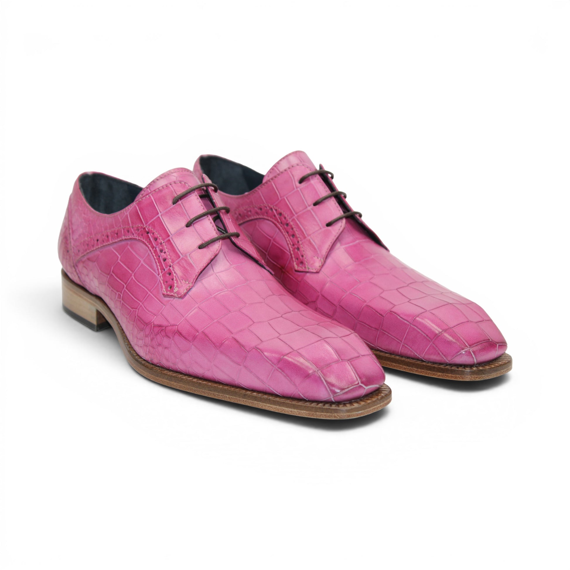 The Duca Di Matiste Duca Spada Pink is a single pink Italian leather dress shoe featuring a crocodile pattern, black laces, and a light brown sole, shown in a side view.