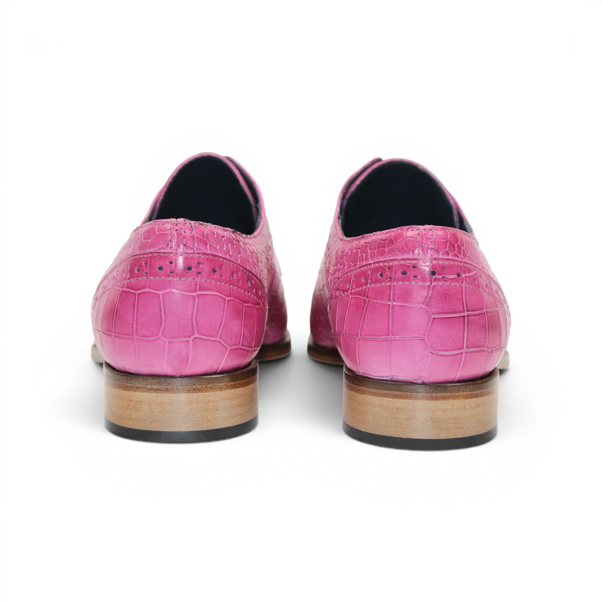The Duca Di Matiste Duca Spada Pink is a single pink Italian leather dress shoe featuring a crocodile pattern, black laces, and a light brown sole, shown in a side view.