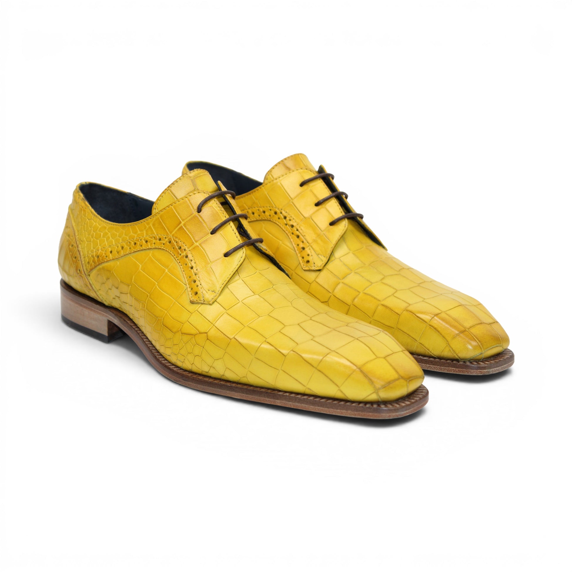 The Duca Di Matiste Duca Spada Yellow is a yellow, crocodile-patterned genuine leather lace-up dress shoe with a wooden sole and low heel, displayed in side profile on a white background.