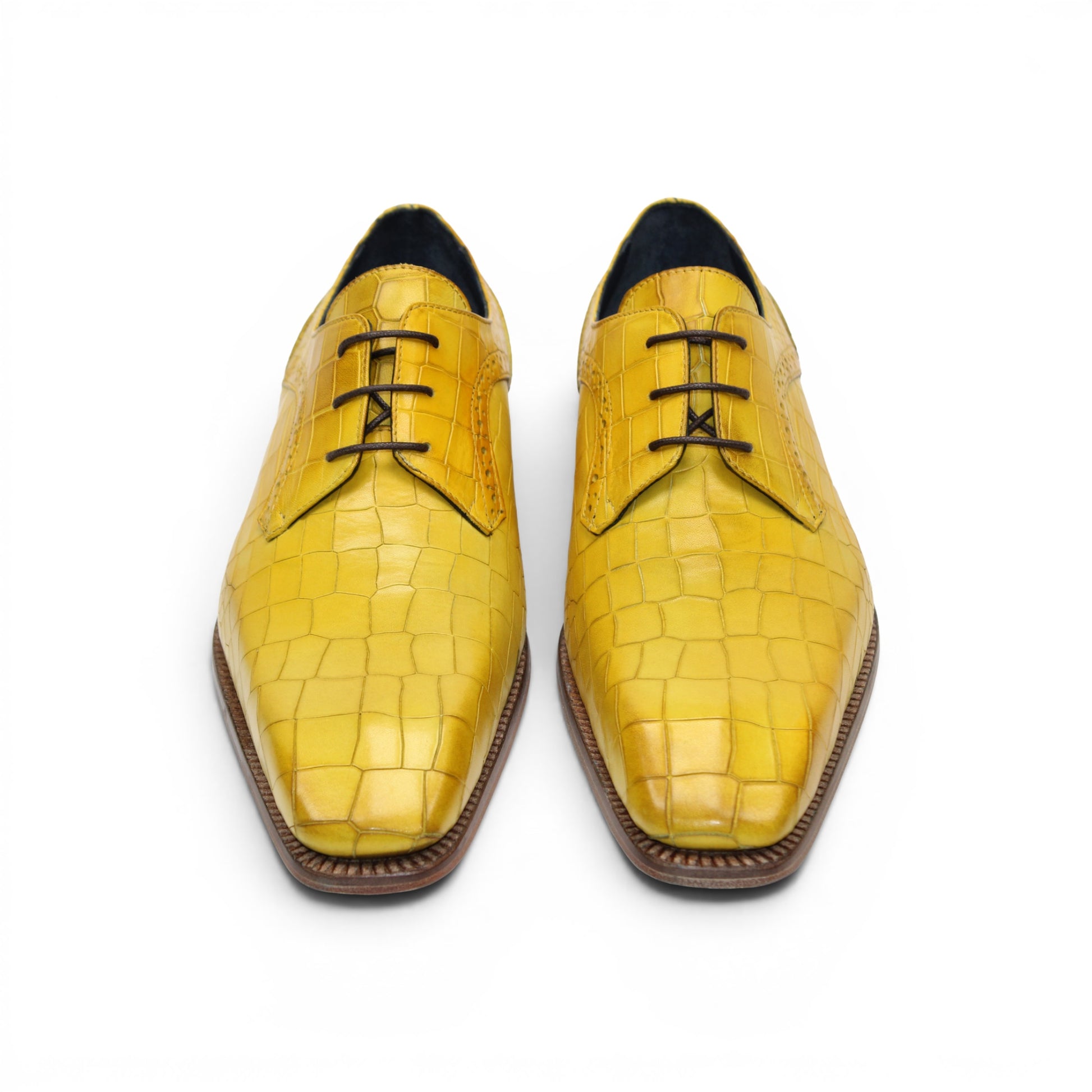 The Duca Di Matiste Duca Spada Yellow is a yellow, crocodile-patterned genuine leather lace-up dress shoe with a wooden sole and low heel, displayed in side profile on a white background.