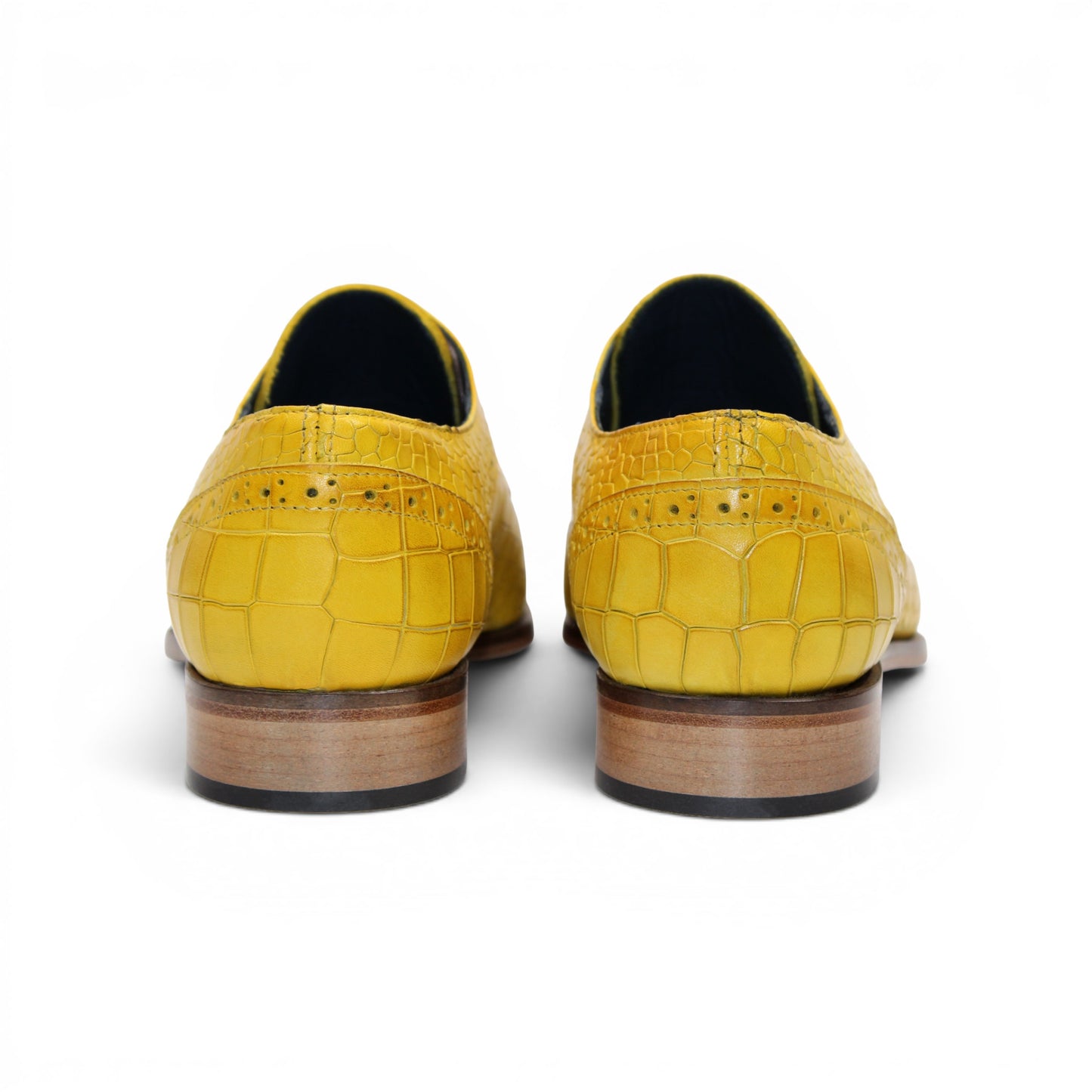 The Duca Di Matiste Duca Spada Yellow is a yellow, crocodile-patterned genuine leather lace-up dress shoe with a wooden sole and low heel, displayed in side profile on a white background.