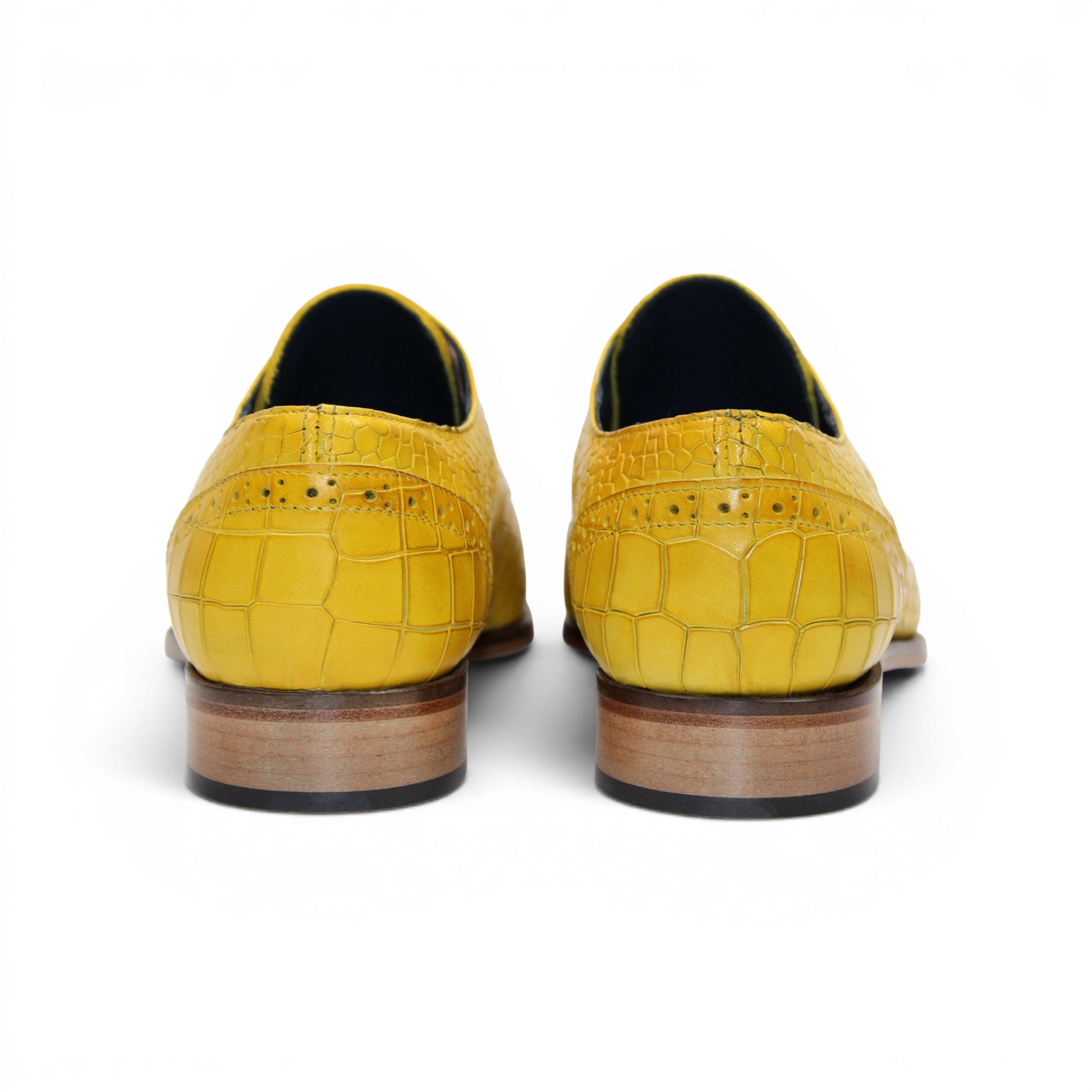 The Duca Di Matiste Duca Spada Yellow is a yellow, crocodile-patterned genuine leather lace-up dress shoe with a wooden sole and low heel, displayed in side profile on a white background.