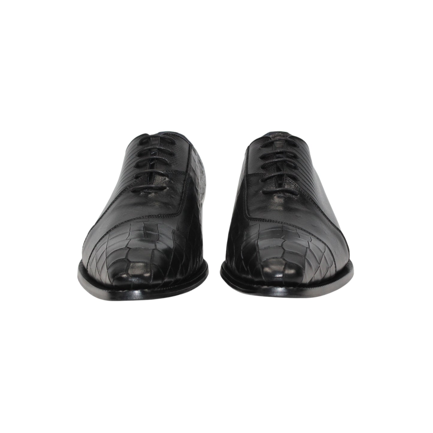 The Duca Spoleto I Black by Duca Di Matiste is a black luxury leather shoe with a pointed toe and embossed pattern, shown in a side view against a white background.