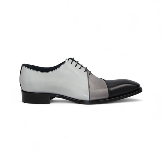 The Duca Di Matiste Duca Spoleto II Black Combo is a men’s Italian handcrafted lace-up dress shoe with black, gray, and white color-block leather, shown in left side profile on a white background.