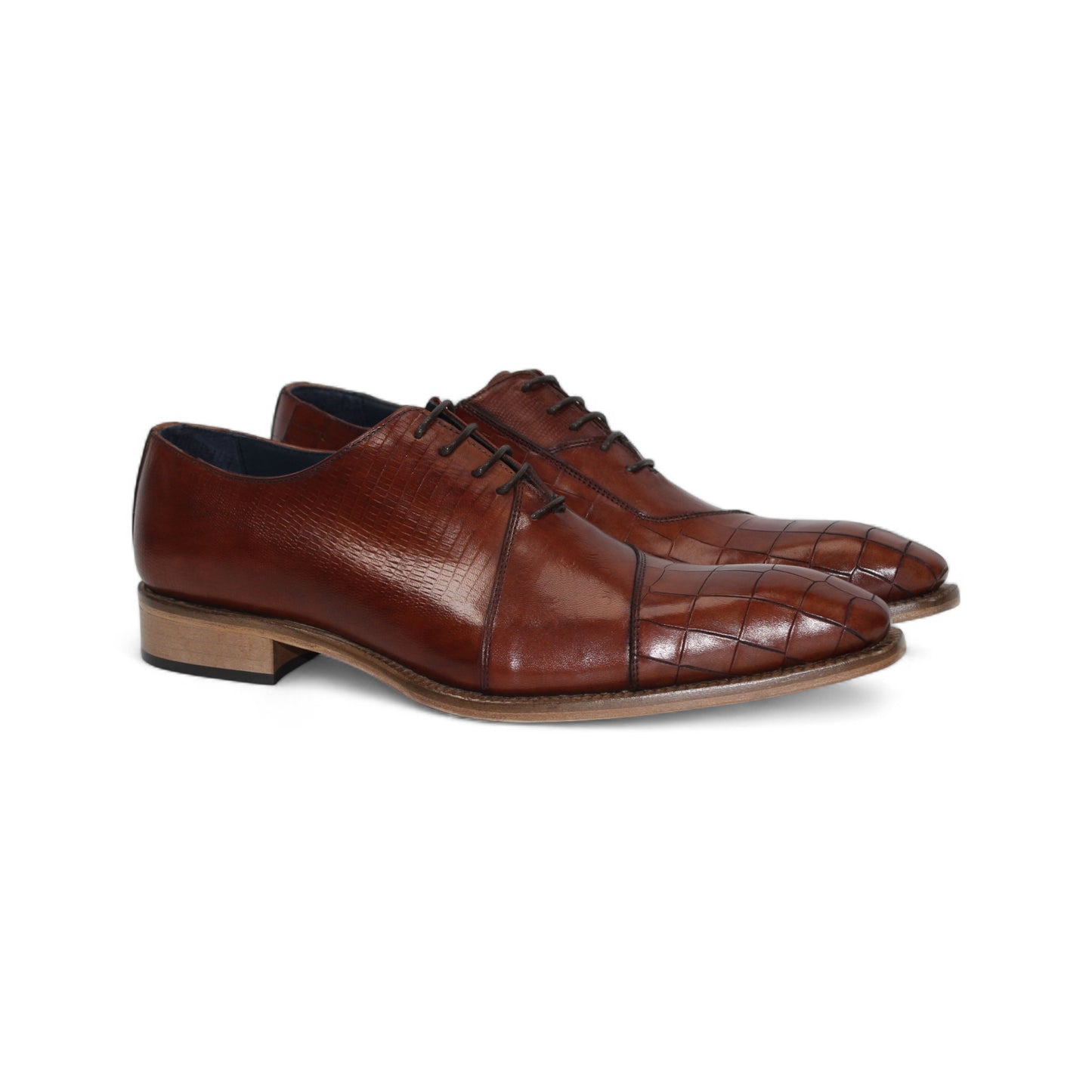 The Duca Spoleto I Brandy by Duca Di Matiste is a brown leather dress shoe with a slight heel, lace-up design, and embossed textured finish, shown in side profile on a white background.