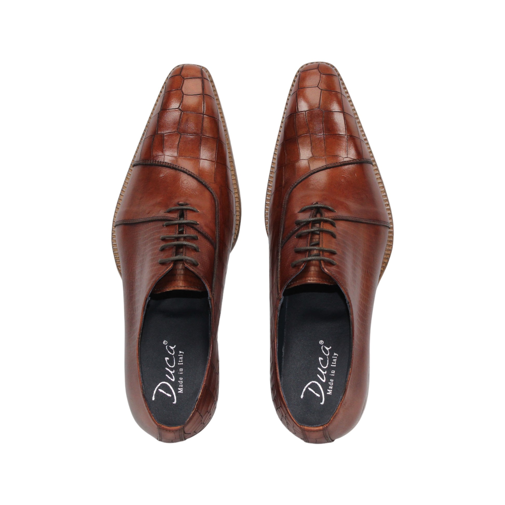 The Duca Spoleto I Brandy by Duca Di Matiste is a brown leather dress shoe with a slight heel, lace-up design, and embossed textured finish, shown in side profile on a white background.