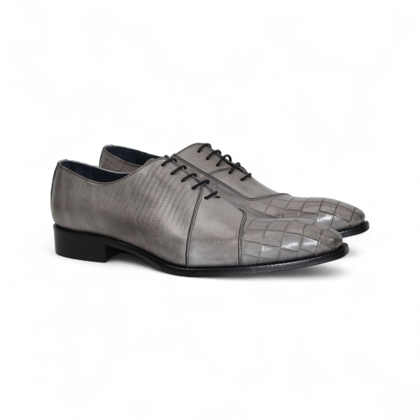 The Duca Di Matiste Duca Spoleto I Grey is a gray embossed leather oxford with a textured toe and side, black sole, and black laces—luxury footwear shown in side profile on a white background.