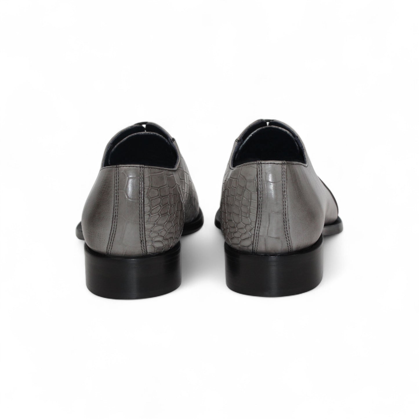 The Duca Di Matiste Duca Spoleto I Grey is a gray embossed leather oxford with a textured toe and side, black sole, and black laces—luxury footwear shown in side profile on a white background.