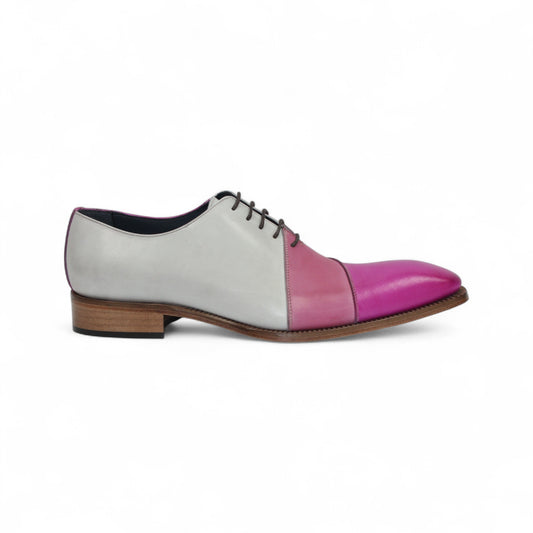 The Duca Di Matiste Duca Spoleto II Pink Combo is a handcrafted Italian men's dress shoe featuring modern color blocking—gray heel, pink midsection, magenta toe—black laces, and a sleek wooden sole for luxurious style.