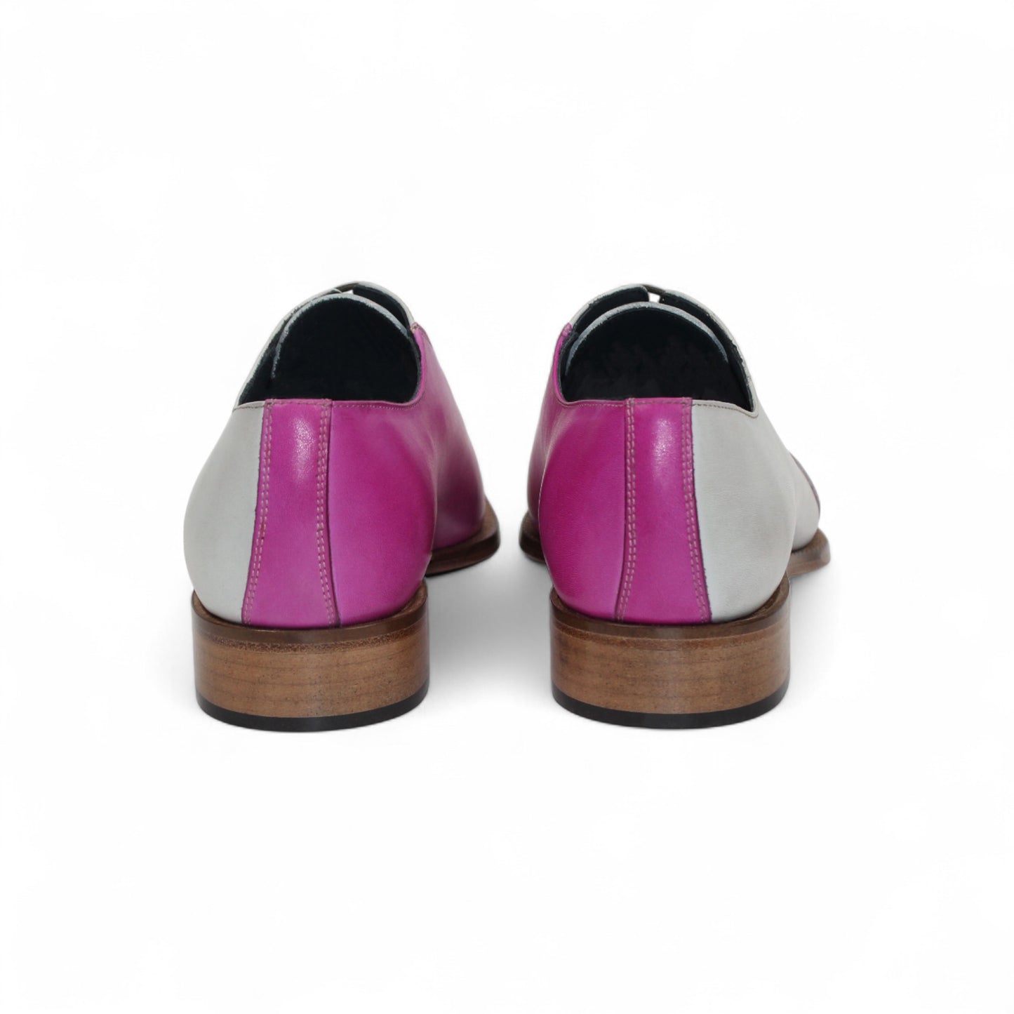 The Duca Di Matiste Duca Spoleto II Pink Combo is a handcrafted Italian men's dress shoe featuring modern color blocking—gray heel, pink midsection, magenta toe—black laces, and a sleek wooden sole for luxurious style.