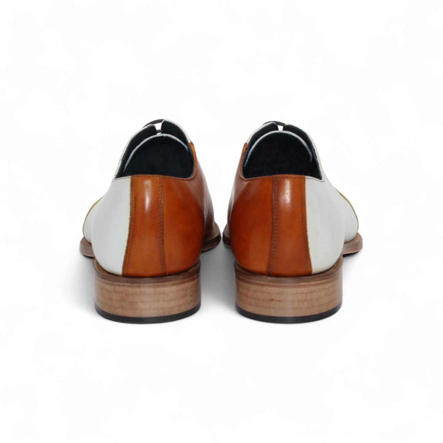 The Duca Spoleto II Yellow Combo by Duca Di Matiste is a luxury leather dress shoe in white, yellow, and brown color blocks with black laces and a light brown sole, expertly handcrafted in Italy and shown in side view on a white background.