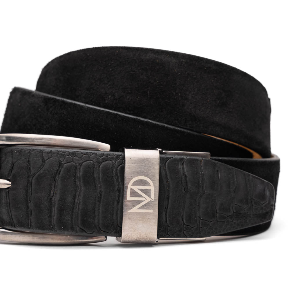 The Hugo Belt Black by Marco Di Milano is crafted from black ostrich leg-suede and textured leather, featuring a silver buckle with the brand's logo—an ideal accessory to complement luxury footwear.