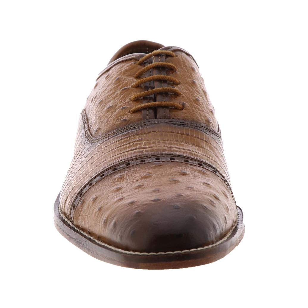Stacy Adams Rodano Shoes in tan feature a textured, ostrich-style leather upper, cap toe design, lace-up closure, and a low stacked heel. Shown in a side view on a white background. Please note: this final sale item from STACY ADAMS cannot be returned or exchanged.