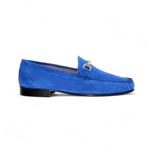 The Duca Di Matiste Duca Termoli Cobalt, a handcrafted blue suede loafer with a silver buckle, is displayed from the side against a plain white background.