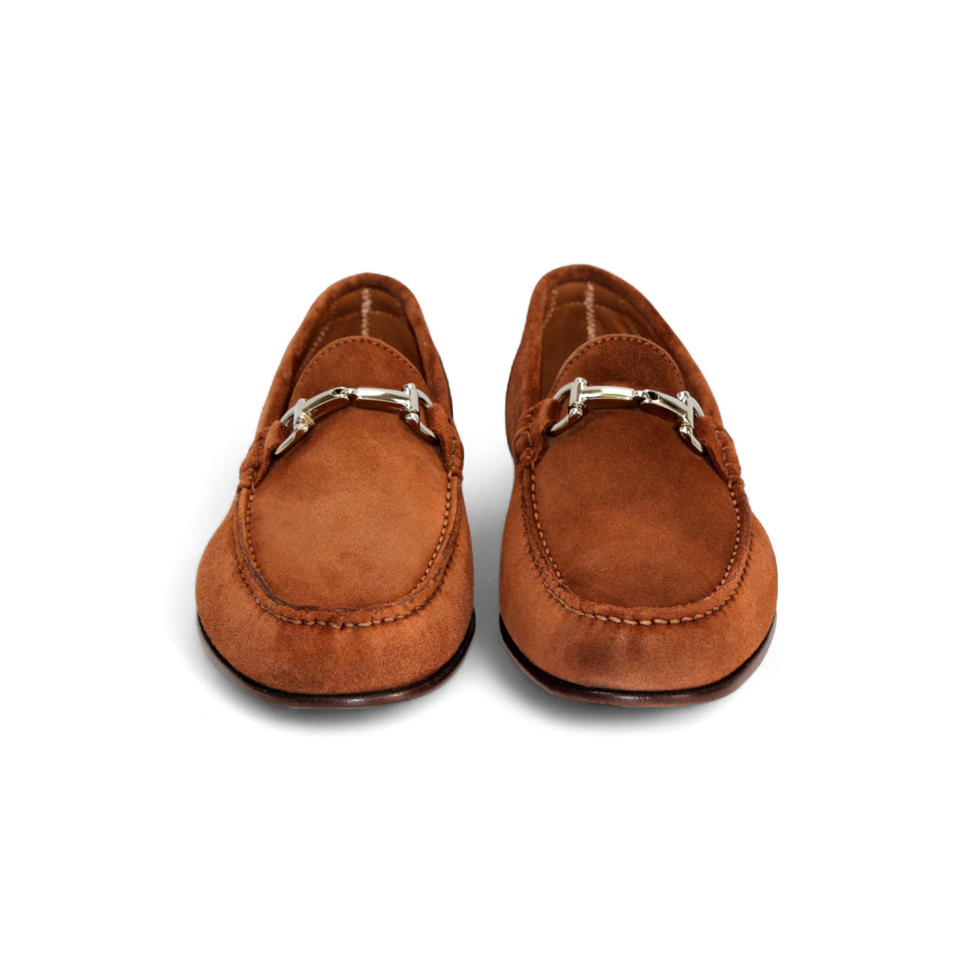 The Duca Di Matiste Duca Termoli Rust is a brown suede loafer with a silver bit, low heel, and moccasin-style stitching, displayed in side profile on a white background.