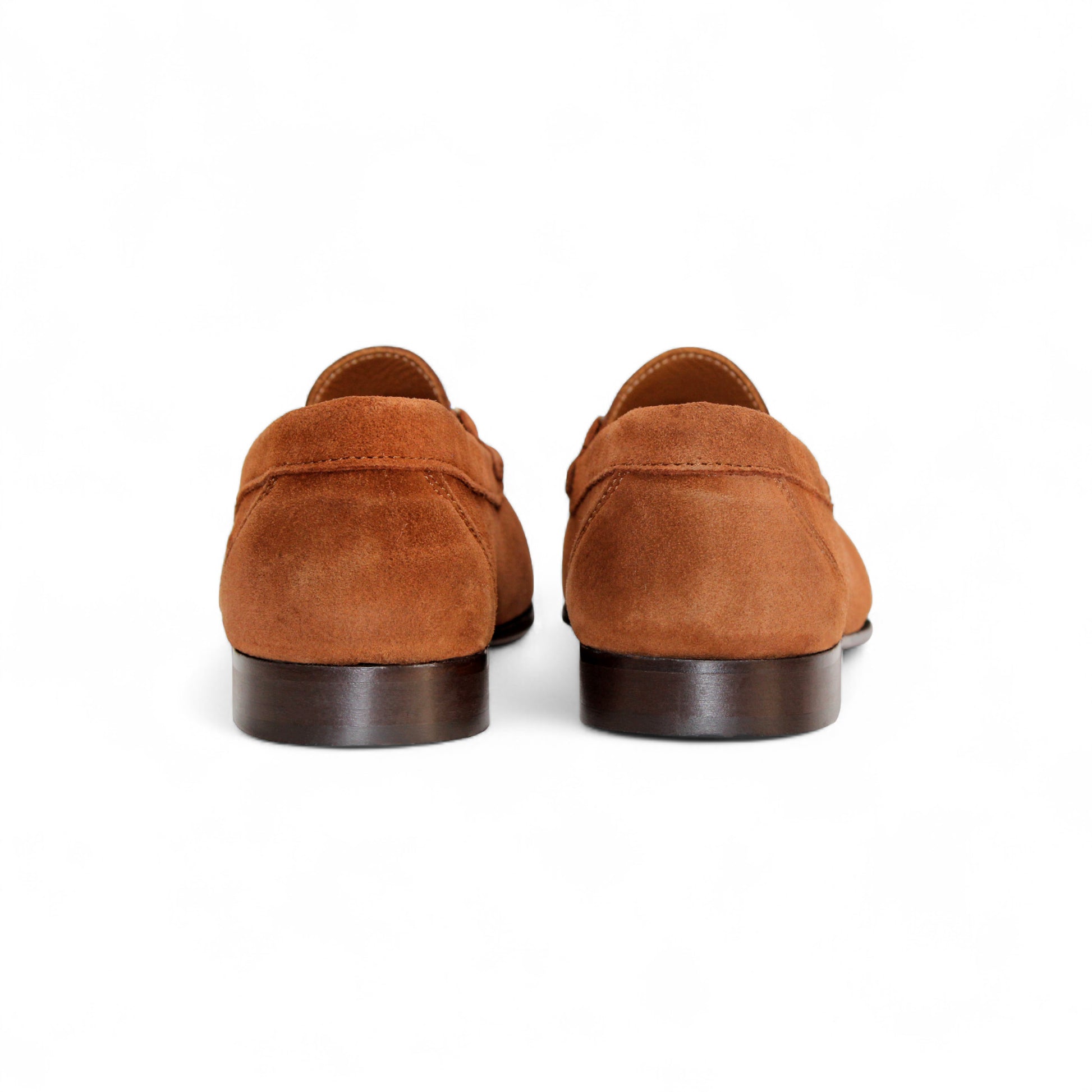 The Duca Di Matiste Duca Termoli Rust is a brown suede loafer with a silver bit, low heel, and moccasin-style stitching, displayed in side profile on a white background.