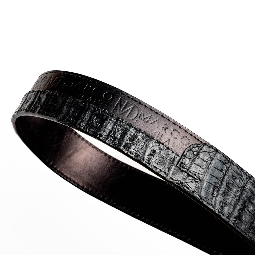 The Texas Belt Black by Marco Di Milano features a bold gold "MD" buckle and embossed branding, styled like a Western belt for a striking statement.