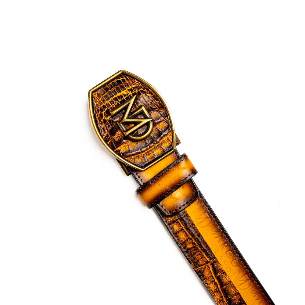 The Texas Belt Mustard Brown by Marco Di Milano features a striking gold "MD" logo buckle—an elegant statement accessory embodying modern sophistication.