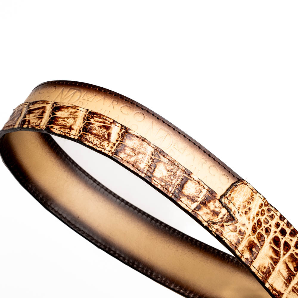 The Texas Belt Stone Orix by Marco Di Milano features embossed tan and brown caiman crocodile leather with a large gold and brown MD logo buckle, shown rolled up against a white background.