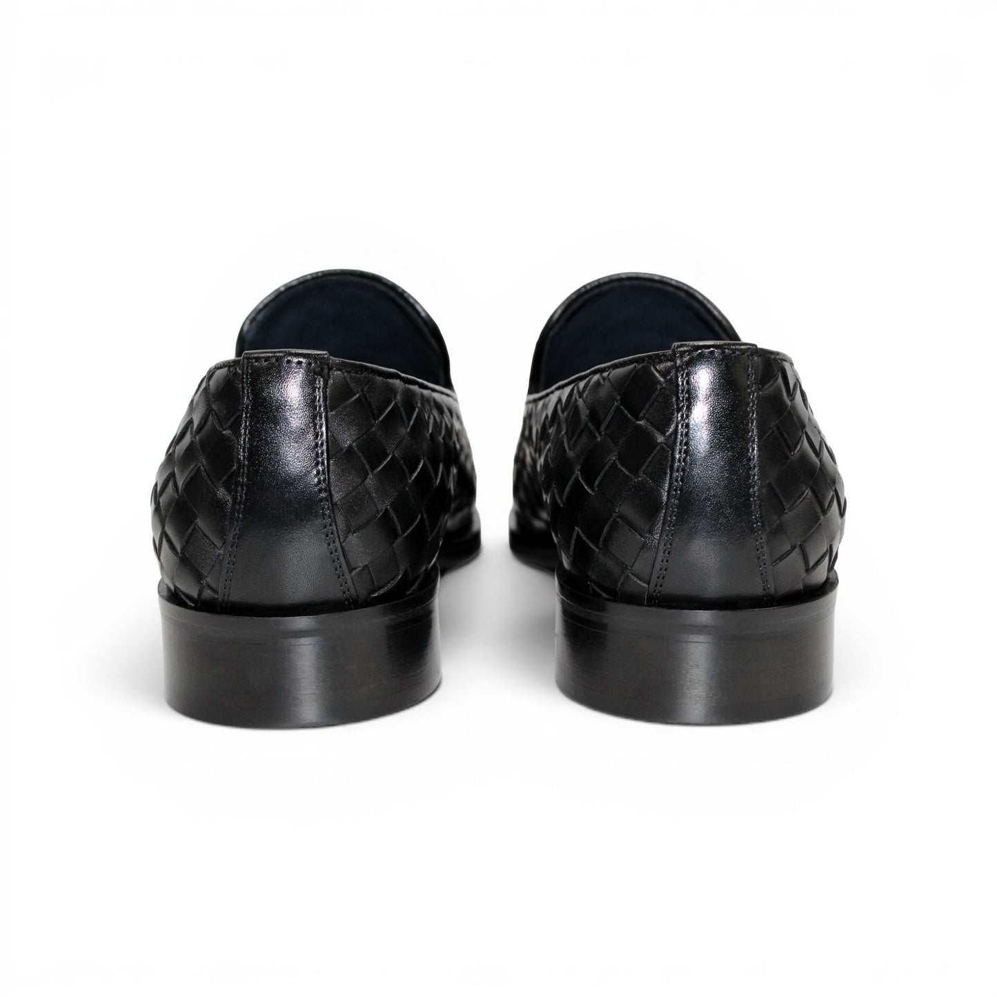 The Duca Di Matiste Duca Tirrenea Black is a black calf weave leather loafer with tassel detail, low heel, and rounded toe, shown in side profile on a white background—an elegant piece of luxury footwear.