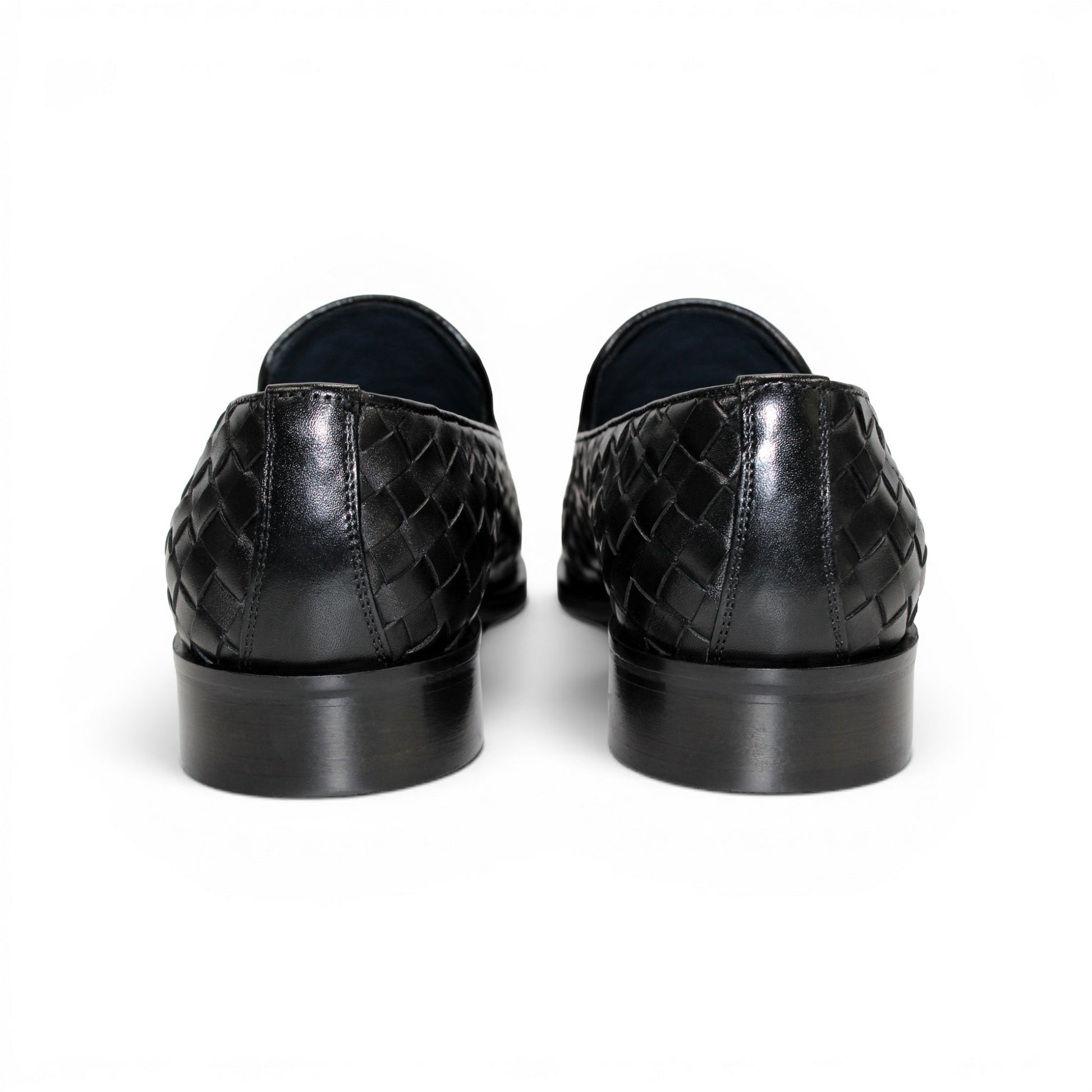 The Duca Di Matiste Duca Tirrenea Black is a black calf weave leather loafer with tassel detail, low heel, and rounded toe, shown in side profile on a white background—an elegant piece of luxury footwear.