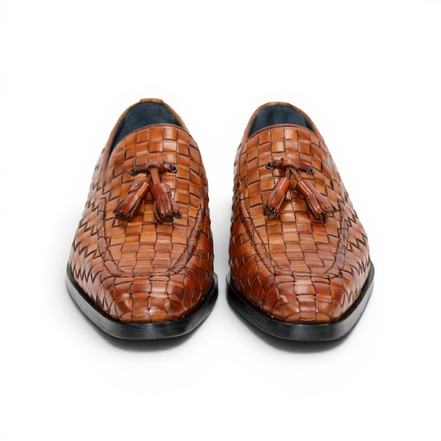 Duca Di Matiste's Duca Tirrenea Cognac: a brown Italian calf weave leather loafer with tassels, low heel, and black sole—luxury footwear shown in side profile on a white background.