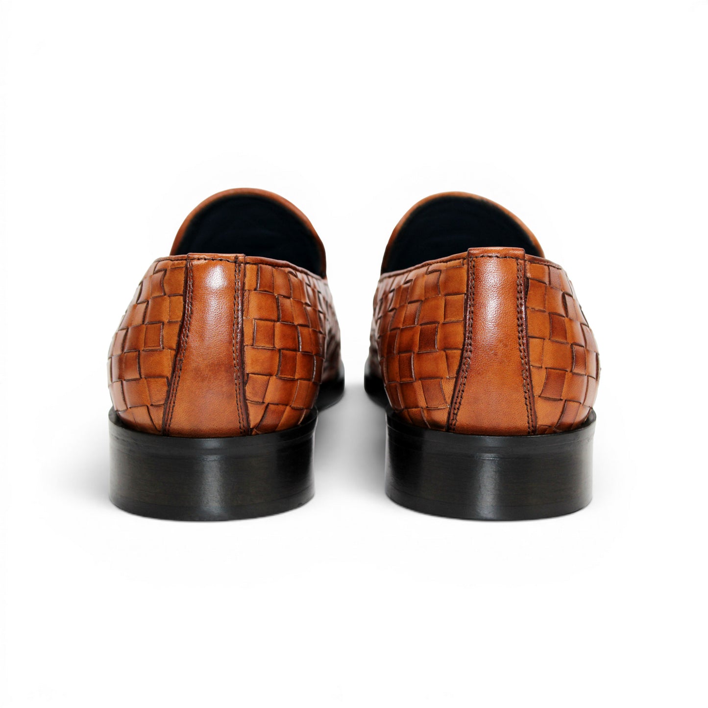 Duca Di Matiste's Duca Tirrenea Cognac: a brown Italian calf weave leather loafer with tassels, low heel, and black sole—luxury footwear shown in side profile on a white background.