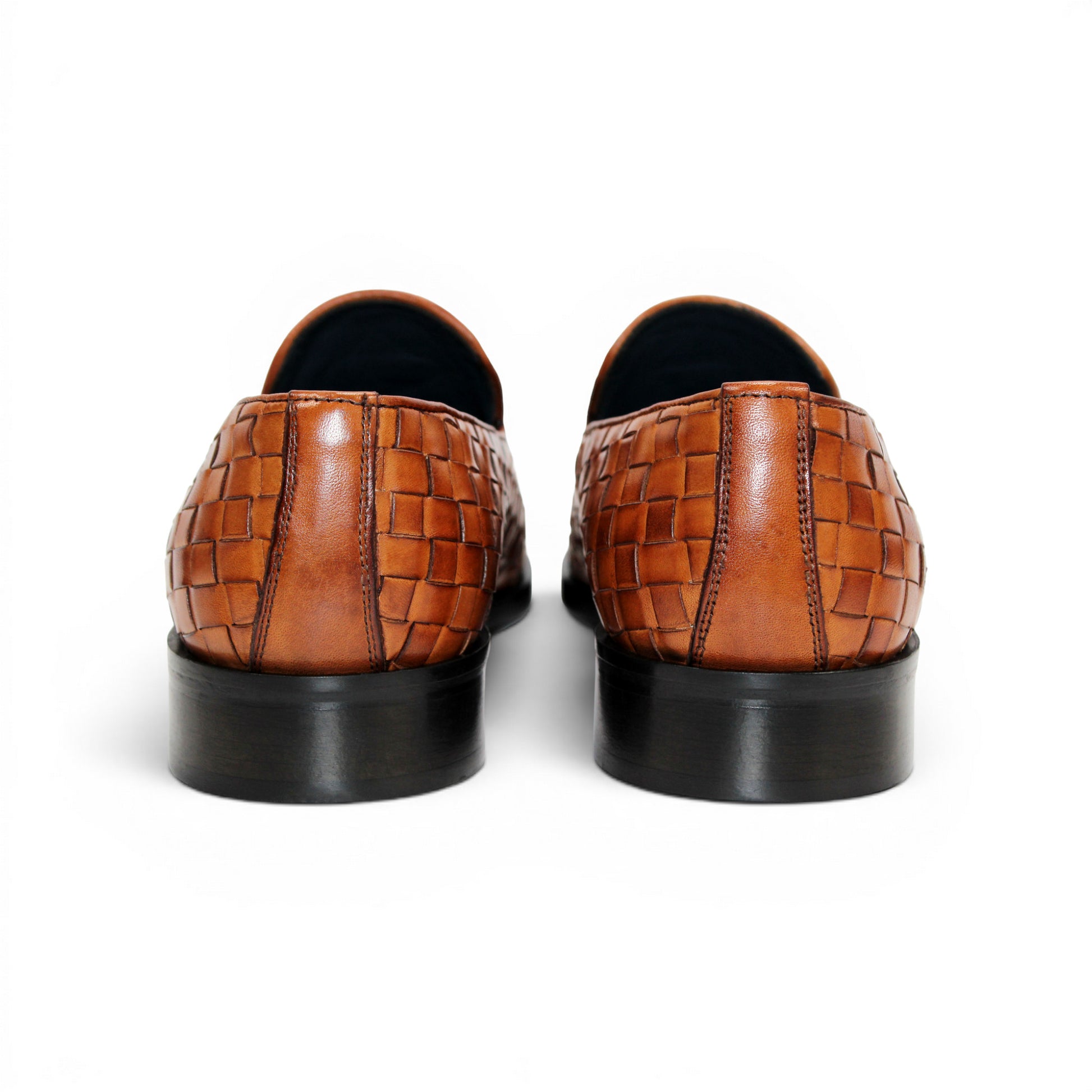 Duca Di Matiste's Duca Tirrenea Cognac: a brown Italian calf weave leather loafer with tassels, low heel, and black sole—luxury footwear shown in side profile on a white background.