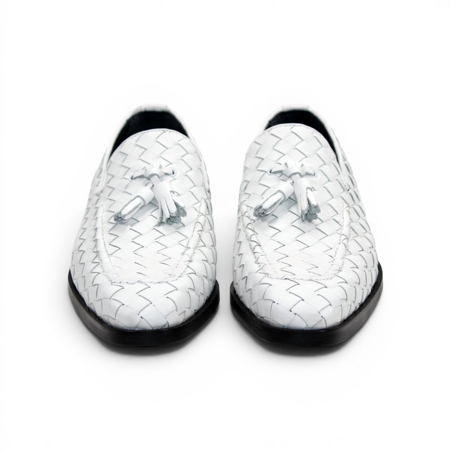 The Duca Tirrenea White by Duca Di Matiste is a white calf weave leather loafer with tassel detail and a black low heel, elegantly crafted in Italy and shown in profile against a plain white background.