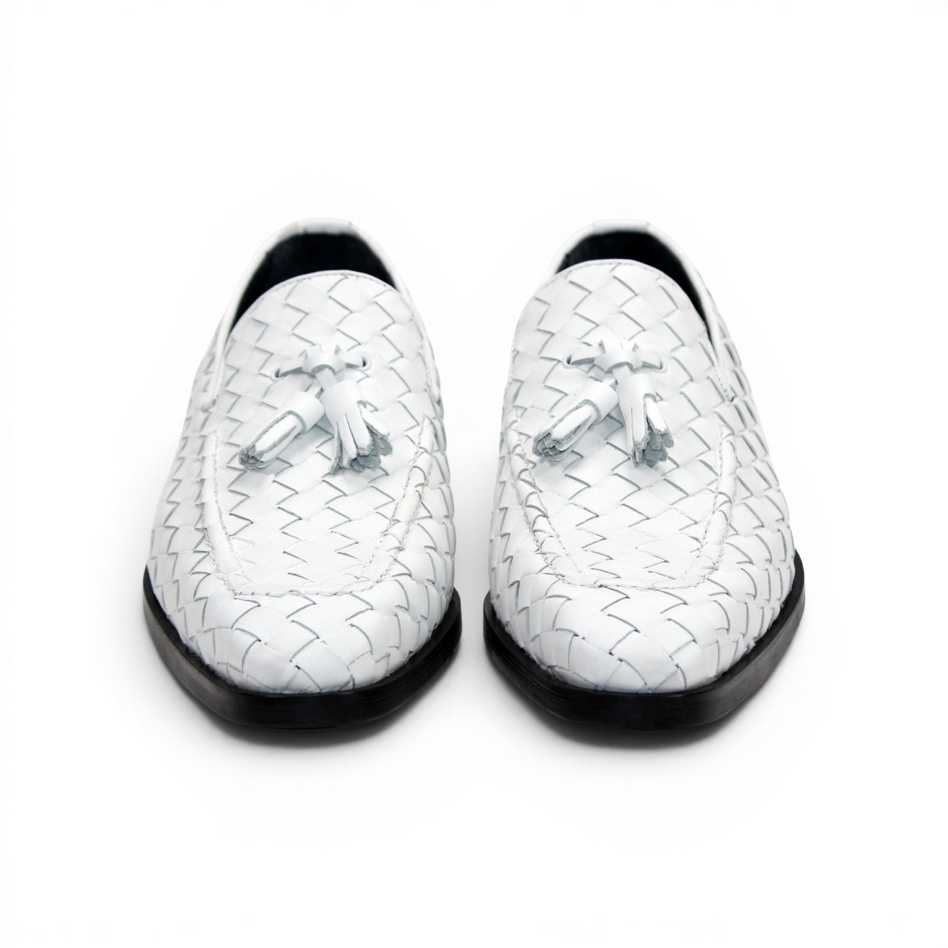 The Duca Tirrenea White by Duca Di Matiste is a white calf weave leather loafer with tassel detail and a black low heel, elegantly crafted in Italy and shown in profile against a plain white background.