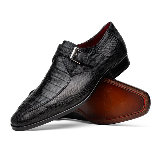 Toluca Black by Marco Di Milano: a black leather dress shoe featuring a crocodile texture and an elegant monk strap side buckle, displayed with one shoe upright and the other revealing its brown leather sole—a refined luxury footwear choice.