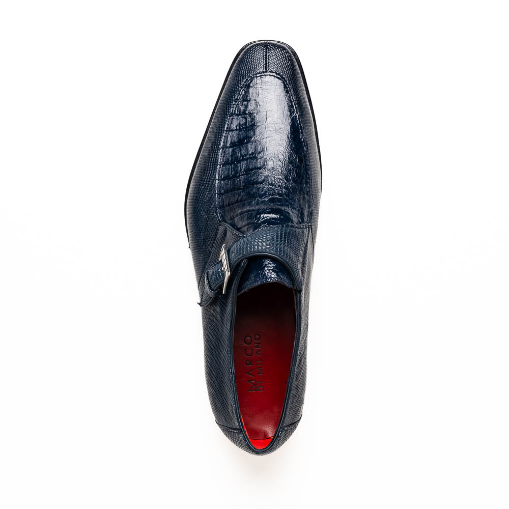 Toluca Navy by Marco Di Milano: a pair of blue textured leather monk strap shoes with a single buckle—one upright, one sole-up showing the brand name—a luxury footwear choice for refined tastes.