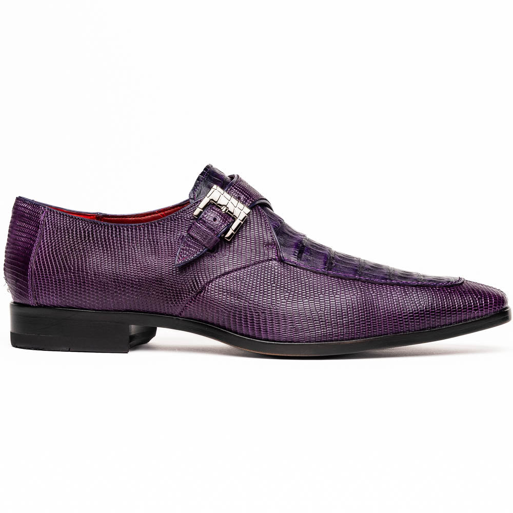 The Toluca Purple by Marco Di Milano is a pair of luxury monk strap shoes with textured purple leather, a silver buckle, red inner lining, and vibrant purple soles—one shoe rests against the other to showcase its unique sole design.