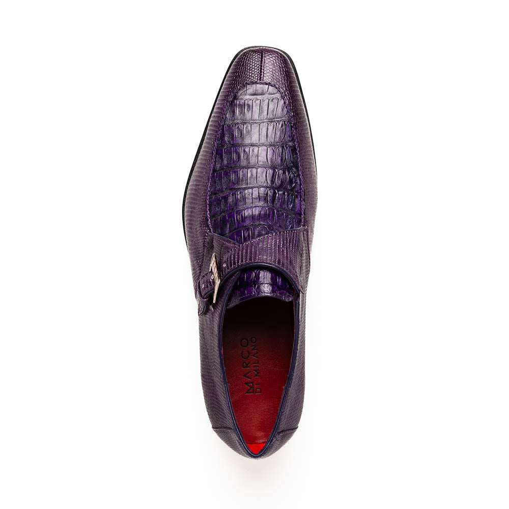 The Toluca Purple by Marco Di Milano is a pair of luxury monk strap shoes with textured purple leather, a silver buckle, red inner lining, and vibrant purple soles—one shoe rests against the other to showcase its unique sole design.
