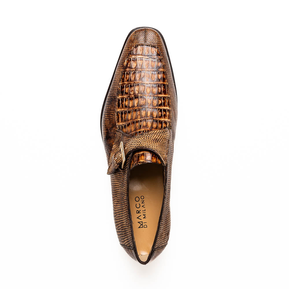 A pair of Toluca Rustic Orix brown leather monk strap shoes by Marco Di Milano, featuring a crocodile pattern—one upright and one showing the branded sole—luxurious footwear perfect for any occasion.