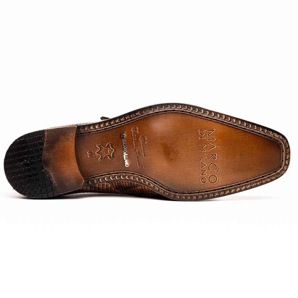 A pair of Toluca Rustic Orix brown leather monk strap shoes by Marco Di Milano, featuring a crocodile pattern—one upright and one showing the branded sole—luxurious footwear perfect for any occasion.