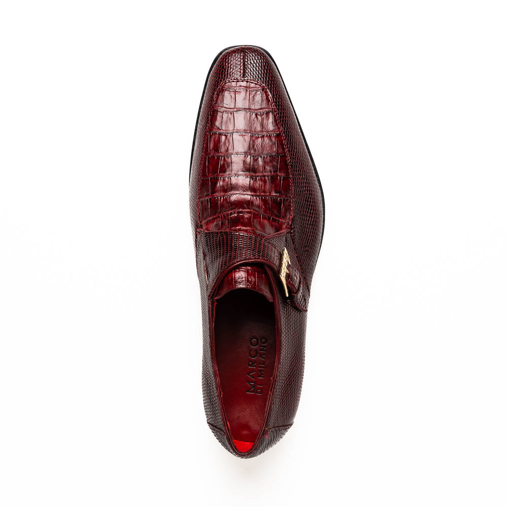 Toluca Wine by Marco Di Milano: Elegant burgundy monk strap shoes with genuine crocodile texture and black soles—one stands upright, the other lies on its side, showcasing luxury craftsmanship.