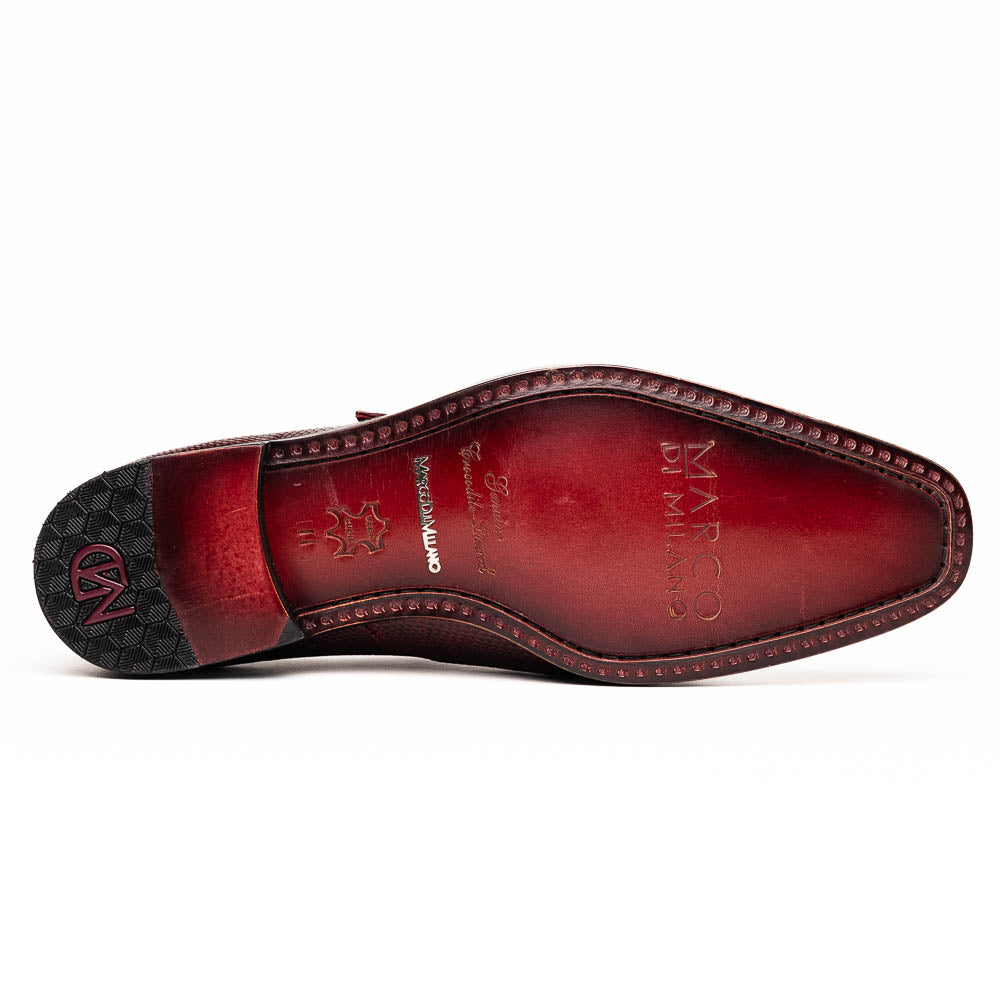 Toluca Wine by Marco Di Milano: Elegant burgundy monk strap shoes with genuine crocodile texture and black soles—one stands upright, the other lies on its side, showcasing luxury craftsmanship.