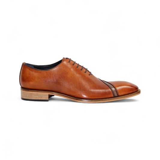 The Duca Di Matiste Duca Torre Cognac/Brown is a brown genuine leather oxford dress shoe with a cap toe, black laces, and a light wooden heel, shown in side profile on a white background.