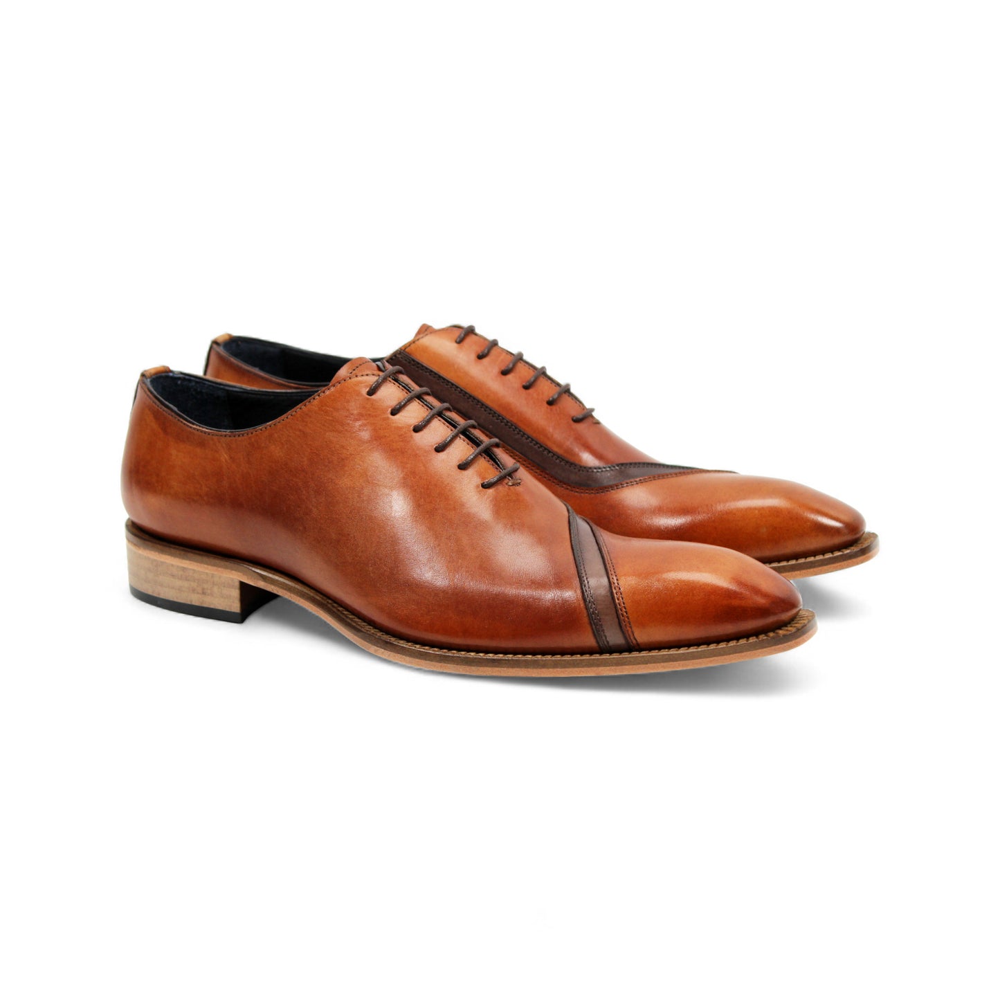 The Duca Di Matiste Duca Torre Cognac/Brown is a brown genuine leather oxford dress shoe with a cap toe, black laces, and a light wooden heel, shown in side profile on a white background.