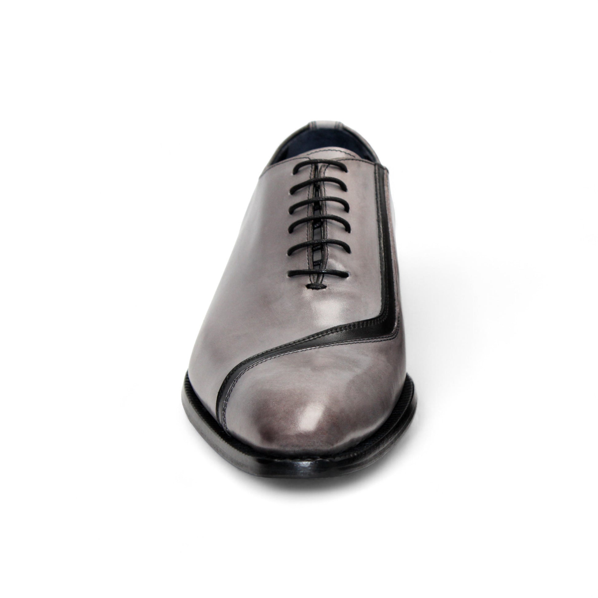 The Duca Di Matiste Duca Torre Light Grey/Black Italian leather oxford dress shoe features a light grey upper, black cap toe, and black sole, displayed against a white background.